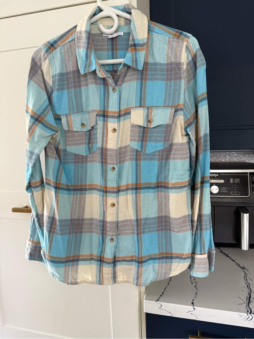 Woman’s Light Blue Plaid Button-Up Shirt medium